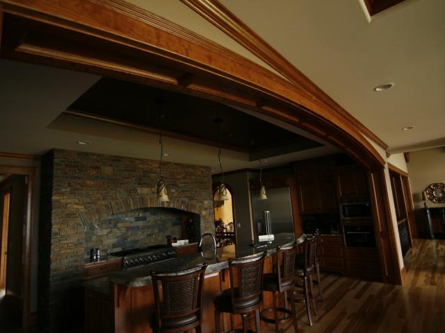 arched casing-luxury bar-stone fireplace 